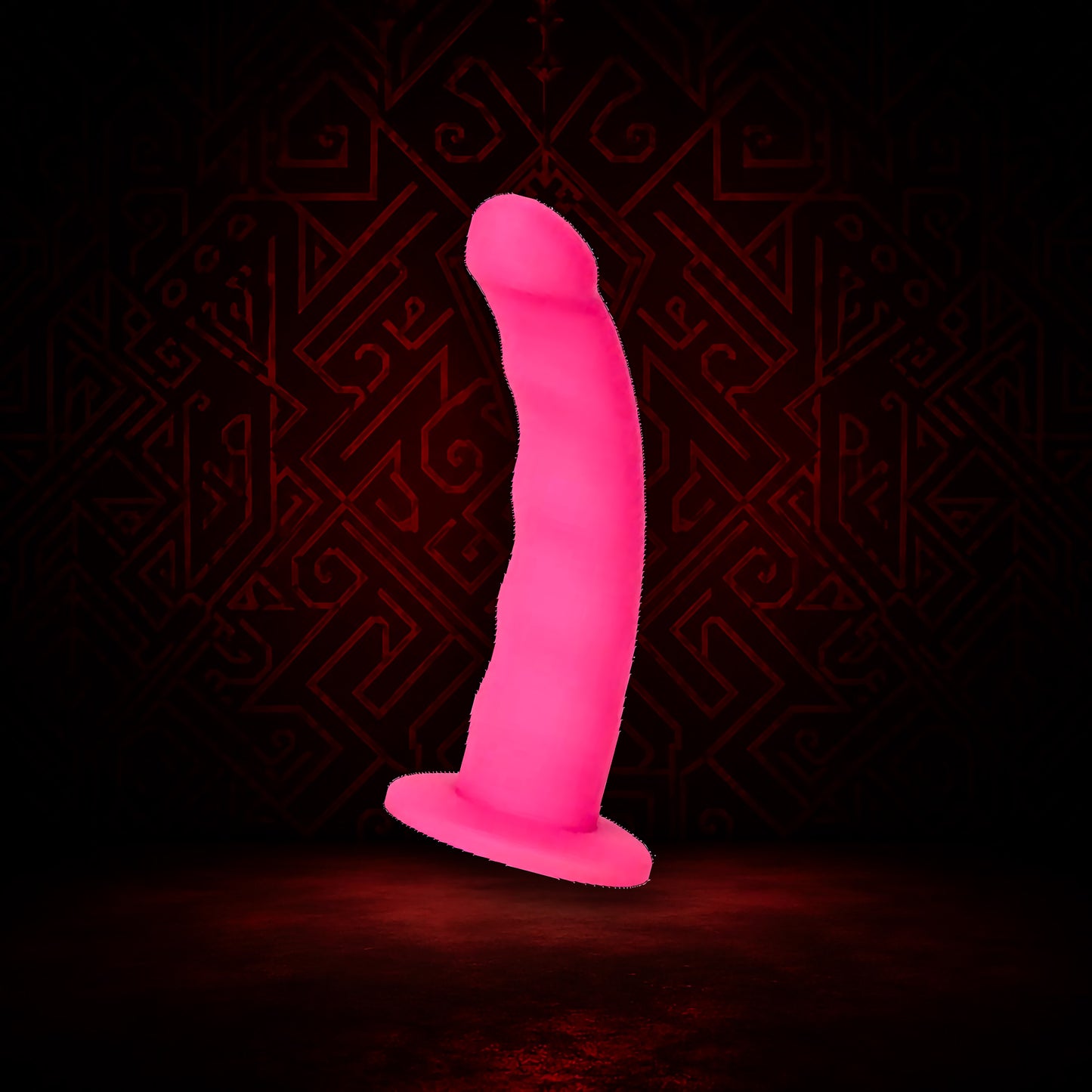 Pink object resembling a phallic shape against a dark background with red patterns